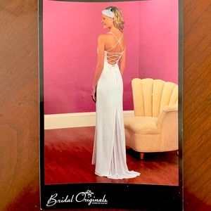 Wedding dress, never worn. Perfect for summer wedding